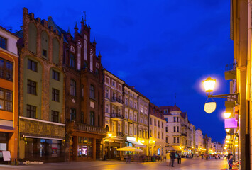 Fototapeta premium Image of Torun city historical streets and building at evening in Poland