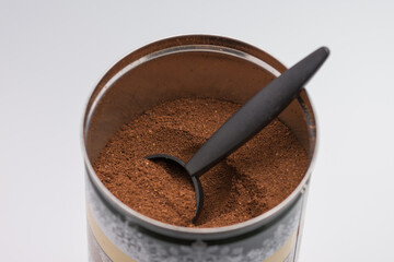 Ground coffee in a metal box