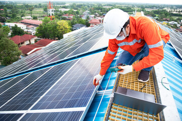 Engineer inspects photovoltaic system equipment, solar power plants