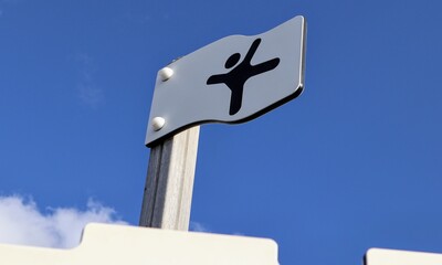 Flag-style white sign 