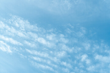 blue sky with white soft clouds