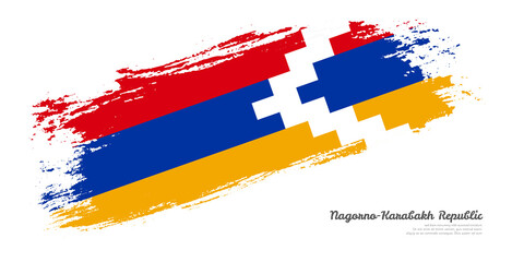Hand painted brush flag of Nagorno-Karabakh Republic country with stylish flag on white background