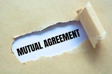 Text sign showing MUTUAL AGREEMENT