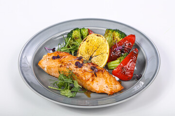 Roasted salmon fillet with vegetables