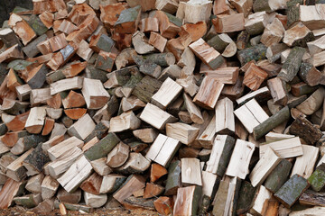 A pile of chopped firewood ready for stacking