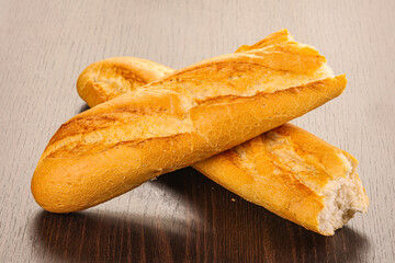Crust tasty baguette over board