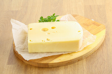 Maasdam cheese over the board