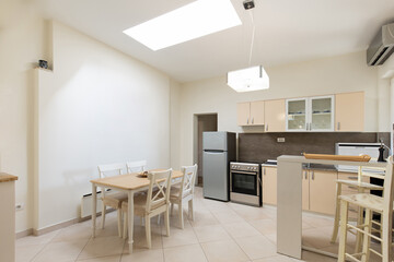 Interior of a kitchen with dining area