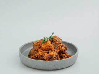 Rendang Beef Cubes in a grey dish