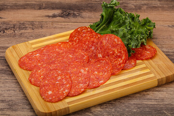 Italian spycy pepperoni sausage slices