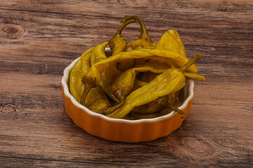 Marinated spicy and hot green pepper