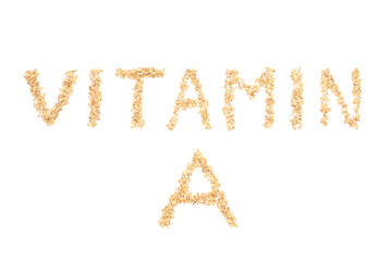 Text VITAMIN A made of oats on white background