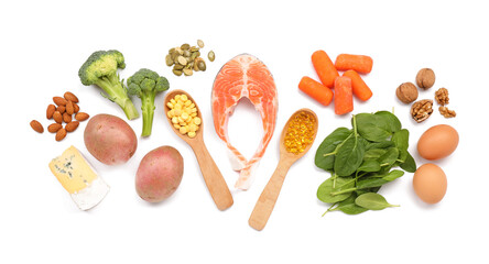 Healthy products with pills on white background