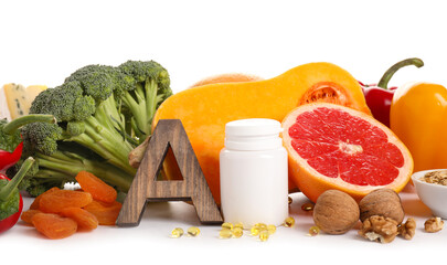 Healthy products rich in vitamin A on white background