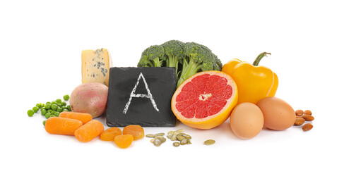 Healthy products rich in vitamin A on white background