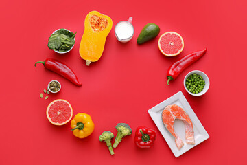 Frame made of healthy products on color background