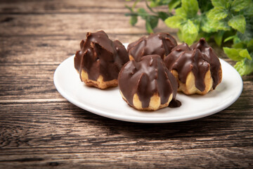 chocolate eclair on a plate