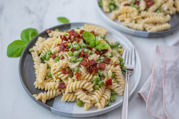 healthy home made ricotta pasta with bacon and peas
