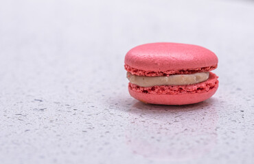 French cake macaron on white background. Tasty fruit, almond sweet cookie.
