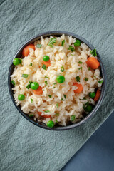 Vegan rice, shot from above on a blue background
