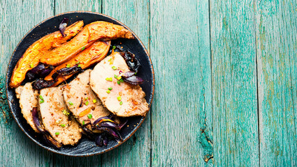 Roasted meat with sweet potatoes,copy space