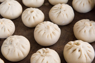 Chinese traditional food steamed stuffed buns in a container