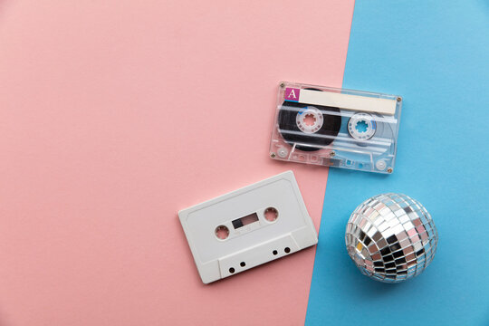 Retro disco glitter ball with a vintage cassette tape