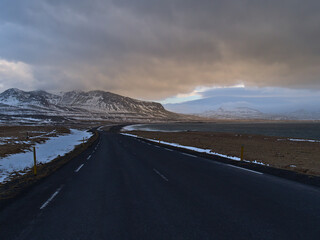 Stunning view with diminishing perspective of road Snæfellsnesvegur (route 54) on the northern...