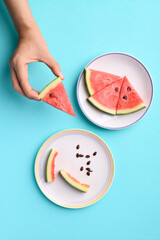 Sliced watermelon fruits with bite and seeds on plate, Tropical fruit, Summer season