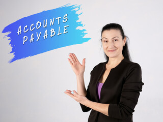 Financial concept meaning ACCOUNTS PAYABLE with sign on the gray wall