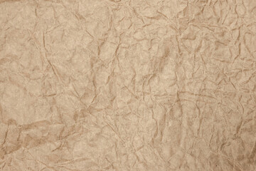 Brown old paper rough and crumpled, wrinkled, aged, ancient for texture background