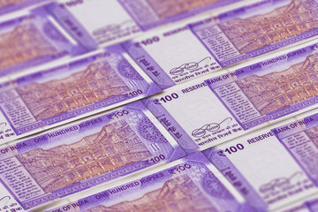 Indian rupees banknotes background. 100 INR