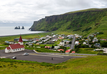  The small resort community of Vik, Iceland, lying on the Atlantic Ocean on Iceland's South coast