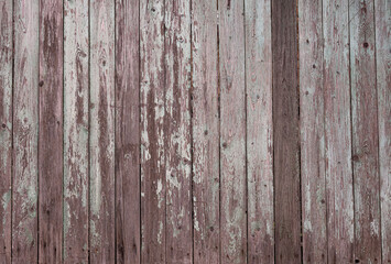old fence with peeling paint, uneven background, texture