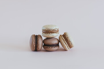 Tasty French macarons  on a pastel background.