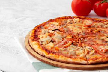 Freshly baked pizza on table close up