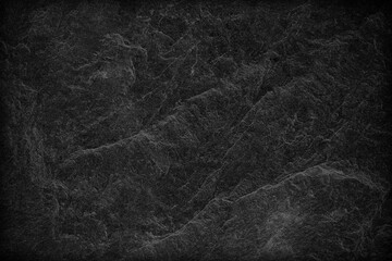 Dark grey black slate background or texture. © peekeedee