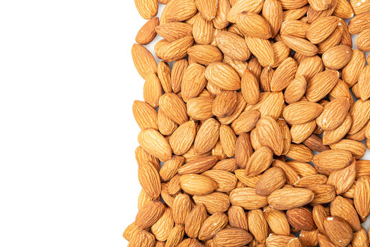 Close up. Frame. Dry  almonds.  Shelled almonds on a white background,