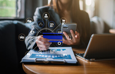 Women hold credit cards, conduct financial transactions via smart phone  and data documents, put on...