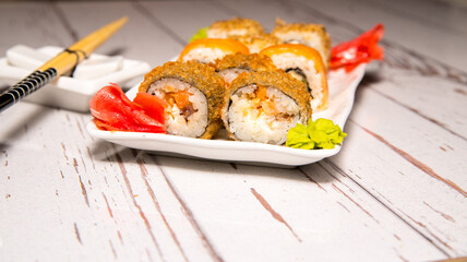 Shui rolls on a white plate close-up, copy space, template