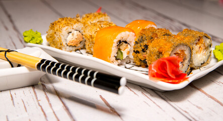 Shui rolls on a white plate close-up, copy space, template