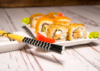 Shui rolls on a white plate close-up, copy space, template