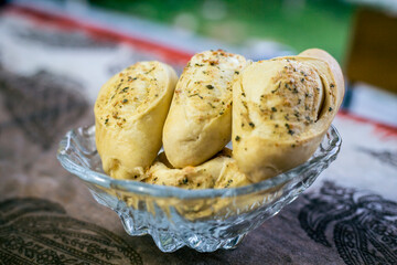Tasty bread with garlic, cheese and herbs