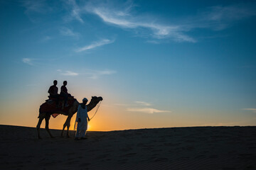 Camel safari Thar desert India.