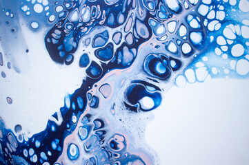 Acrylic pouring painting, deep blue paint texture, fluid art texture, blue and white paint cells, sea surface