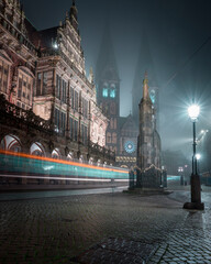 The Bremer Roland, Bremer Dom and the Rathaus on a rainy night - obrazy, fototapety, plakaty