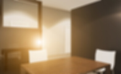 Bokeh blurred phototography.  . Sunset.. Modern office Cabinet.  3D rendering.   Meeting room