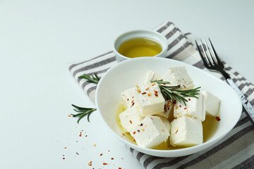 Concept of tasty food with feta cheese on white background