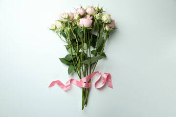 Bouquet of beautiful roses on white background