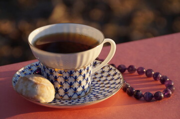 a cup of tea with gingerbread